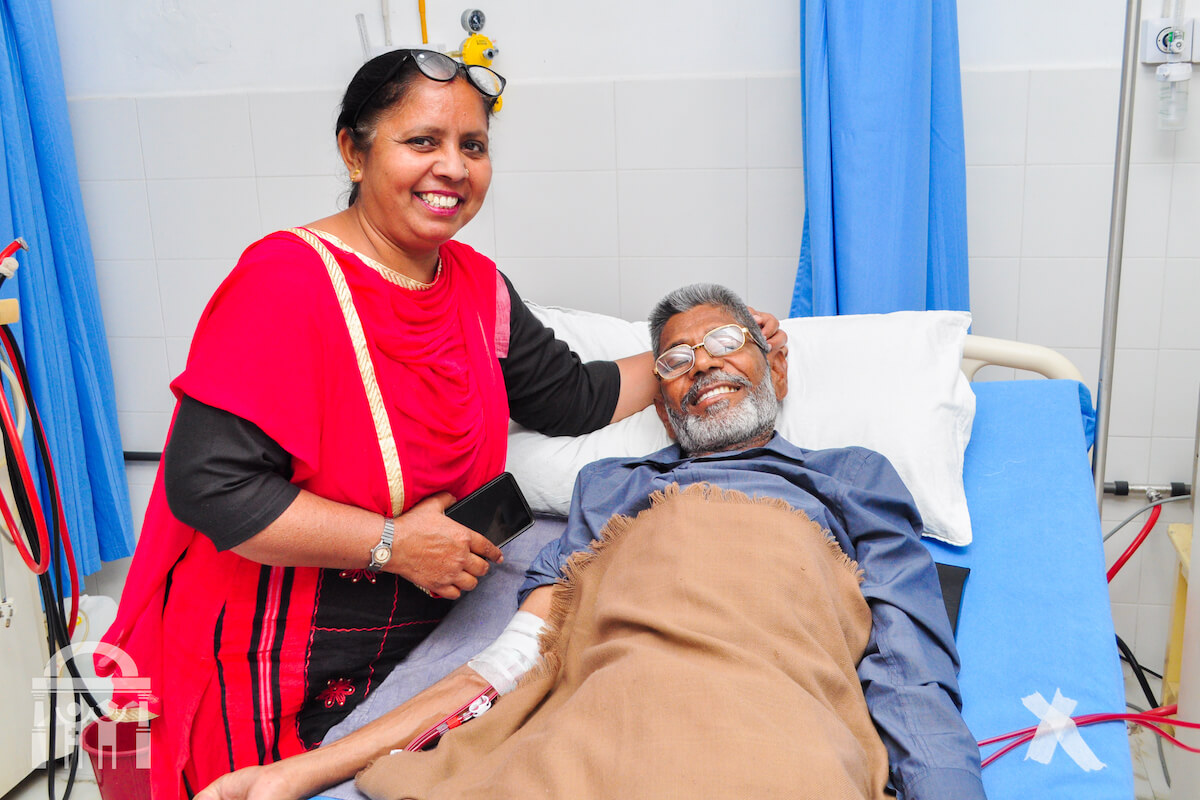 Patient on dialysis with family member at Guru Nanak Mission Hospital Dhahan Kaleran near Banga in Punjab